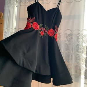 Black mini dress with flower details